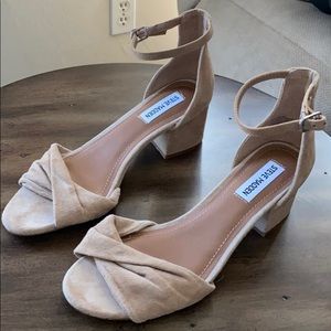 Low heeled block sandals.